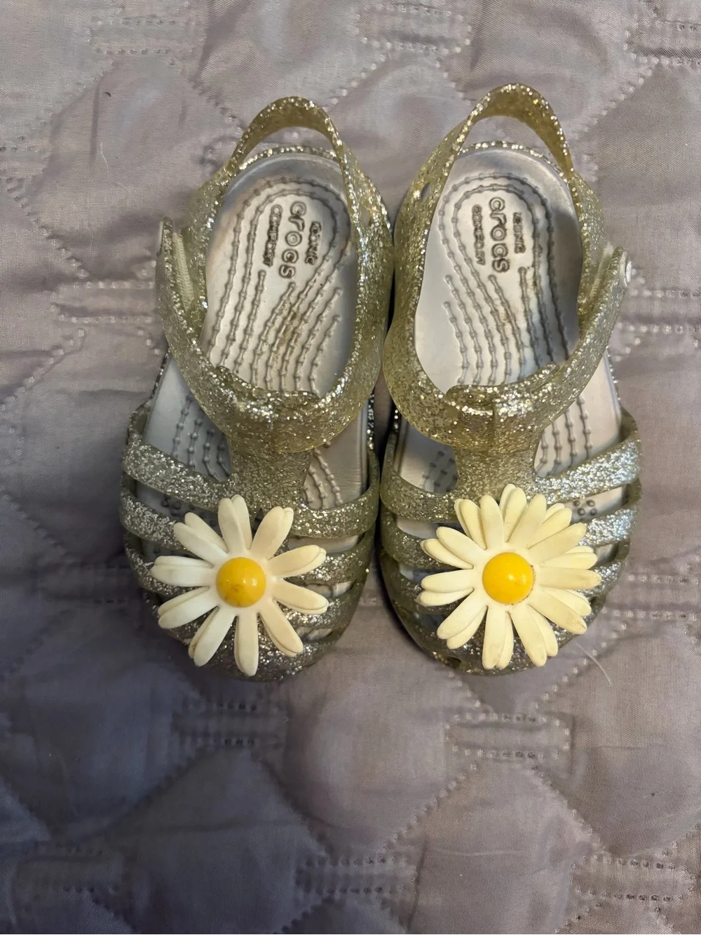 CROCS Kids Glitter Jelly Sandals with Daisy Accent — Gold